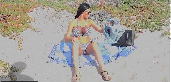 Jasmine Jae is a hot MILF with big tits and a pierced clit. The trio go to the beach where Jasmine exposes her pussy for the public to see!